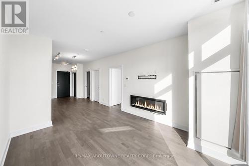 404 - 1575 Lakeshore Road N, Mississauga (Clarkson), ON - Indoor With Fireplace