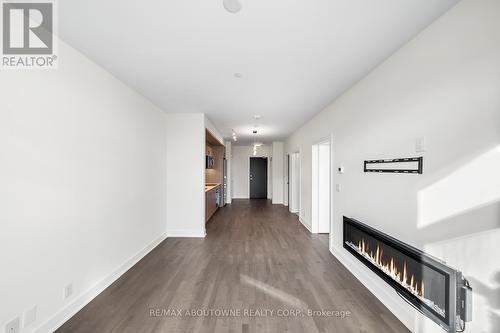 404 - 1575 Lakeshore Road N, Mississauga (Clarkson), ON - Indoor With Fireplace