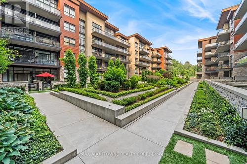 404 - 1575 Lakeshore Road N, Mississauga (Clarkson), ON - Outdoor With Balcony With Facade