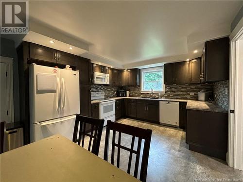 9 King Street, Grand Manan, NB - Indoor Photo Showing Kitchen With Double Sink