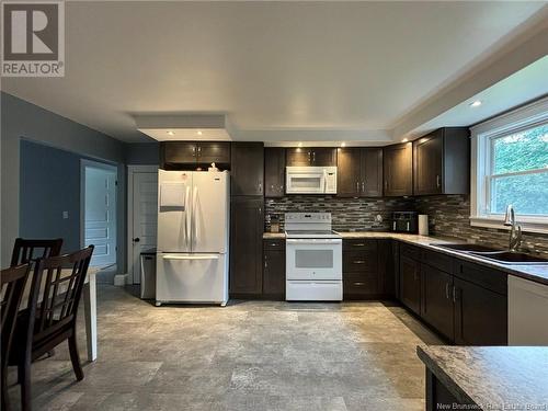 9 King Street, Grand Manan, NB - Indoor Photo Showing Kitchen With Double Sink