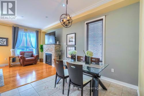 5414 Bellaggio Crescent, Mississauga (East Credit), ON - Indoor Photo Showing Dining Room With Fireplace