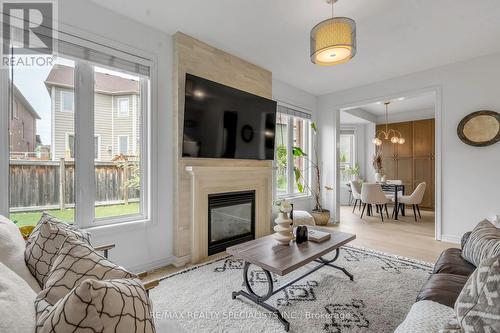 192 Giddings Crescent, Milton (Scott), ON - Indoor Photo Showing Living Room With Fireplace