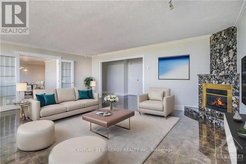 2105 - 1285 Cahill Drive, Ottawa, ON - Indoor Photo Showing Living Room With Fireplace