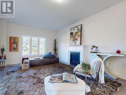 169 Muirfield Drive, Barrie (Ardagh), ON - Indoor Photo Showing Living Room With Fireplace