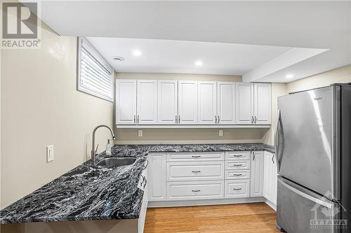 Partial Kitchen in the Basment (Wetbar) - 66 Woliston Crescent, Ottawa, ON - Indoor Photo Showing Kitchen