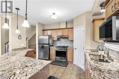 66 Woliston Crescent, Ottawa, ON - Indoor Photo Showing Kitchen With Double Sink