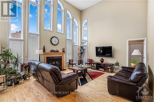 66 Woliston Crescent, Ottawa, ON - Indoor Photo Showing Living Room With Fireplace