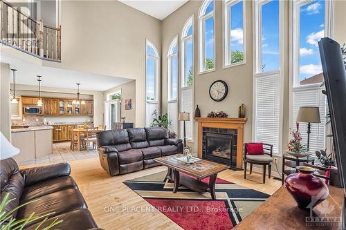 66 Woliston Crescent, Ottawa, ON - Indoor Photo Showing Living Room With Fireplace