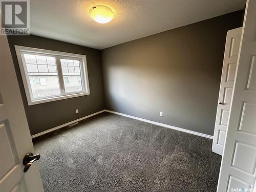 245 4002 Sandhill Crescent, Regina, SK - Indoor Photo Showing Other Room