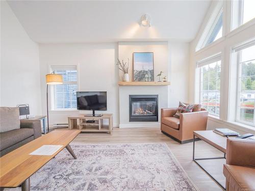 905-1971 Harbour Dr, Ucluelet, BC - Indoor Photo Showing Living Room With Fireplace