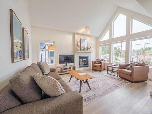 905-1971 Harbour Dr, Ucluelet, BC - Indoor Photo Showing Living Room With Fireplace