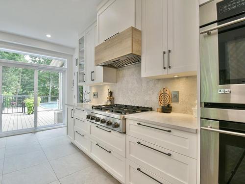 Kitchen - 58 Rue Champêtre, Saint-Hippolyte, QC - Indoor Photo Showing Kitchen With Upgraded Kitchen