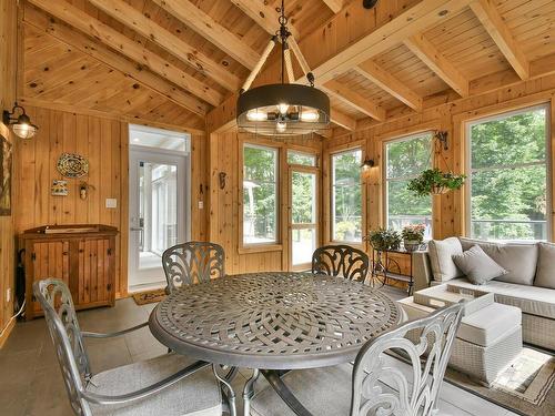 Veranda - 58 Rue Champêtre, Saint-Hippolyte, QC - Indoor Photo Showing Dining Room