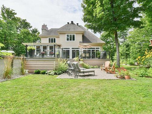 Back facade - 58 Rue Champêtre, Saint-Hippolyte, QC - Outdoor With Deck Patio Veranda