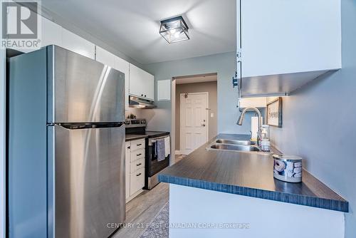 607 - 600 Grenfell Drive E, London, ON - Indoor Photo Showing Kitchen With Double Sink