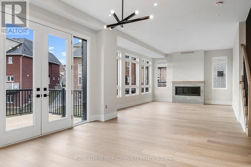 6 Bunn Court, Aurora, ON - Indoor Photo Showing Living Room With Fireplace