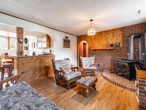 Salle familiale - 1177 Boul. Des Ormeaux, Longueuil (Le Vieux-Longueuil), QC - Indoor Photo Showing Living Room With Fireplace