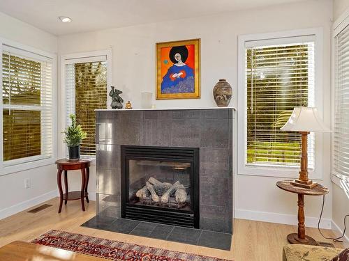 1778 Chandler Ave, Victoria, BC - Indoor Photo Showing Living Room With Fireplace