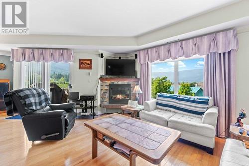 611 Shuswap Street Sw Unit# #204, Salmon Arm, BC - Indoor Photo Showing Living Room With Fireplace