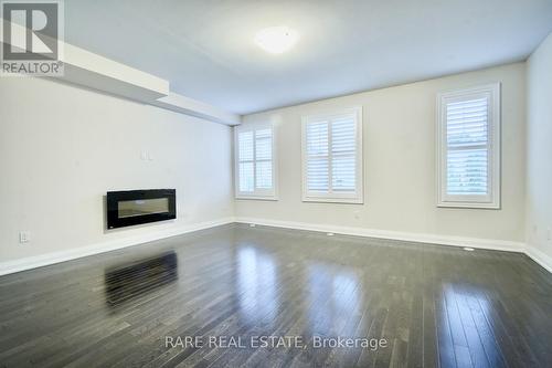 25 Plowman Lane, Richmond Hill (Rouge Woods), ON - Indoor With Fireplace