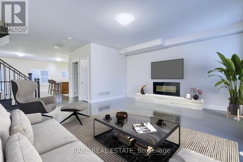 25 Plowman Lane, Richmond Hill (Rouge Woods), ON - Indoor Photo Showing Living Room With Fireplace