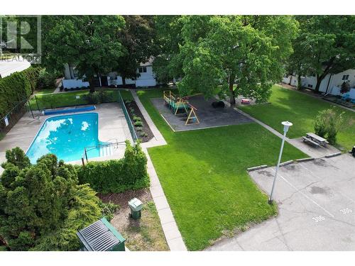 2100 43 Avenue Unit# 107, Vernon, BC - Outdoor With In Ground Pool With Backyard