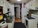 23 2309 17Th Street W, Saskatoon, SK  - Indoor Photo Showing Kitchen With Double Sink 