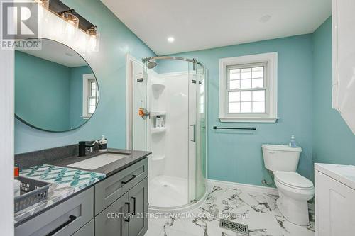 second floor bathroom with laundry - 615 Commissioners Road E, London, ON - Indoor Photo Showing Bathroom