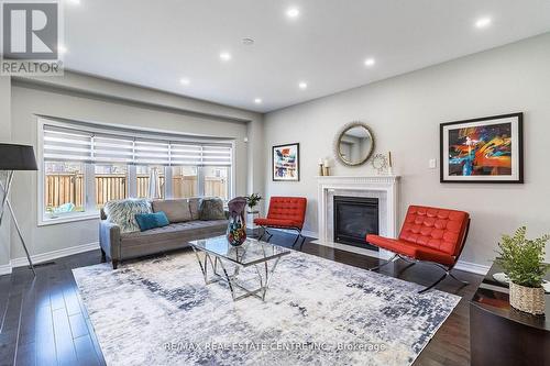 944 Larter Street, Innisfil, ON - Indoor Photo Showing Living Room With Fireplace