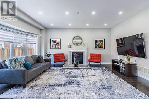 944 Larter Street, Innisfil, ON - Indoor Photo Showing Living Room With Fireplace