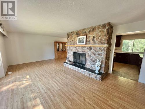 2069 Dragon Lake Road, Quesnel, BC - Indoor Photo Showing Living Room With Fireplace