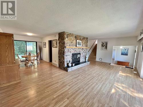 2069 Dragon Lake Road, Quesnel, BC - Indoor Photo Showing Living Room With Fireplace