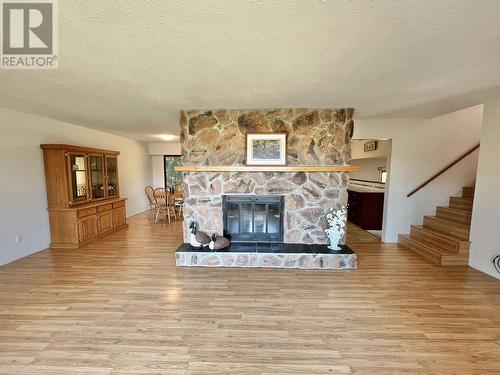 2069 Dragon Lake Road, Quesnel, BC - Indoor Photo Showing Living Room With Fireplace