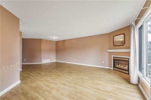 2 Mapleton Avenue, Barrie, ON - Indoor Photo Showing Living Room With Fireplace