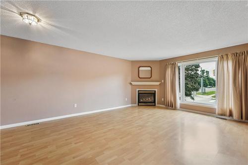 2 Mapleton Avenue, Barrie, ON - Indoor Photo Showing Living Room With Fireplace