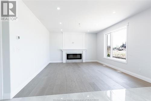 2435 Roxborough, Windsor, ON - Indoor Photo Showing Living Room With Fireplace