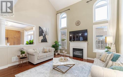 4 Hawkweed Manor, Markham (Box Grove), ON - Indoor Photo Showing Living Room With Fireplace