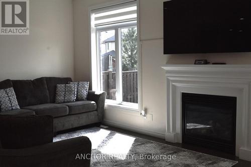 2261 Buroak Drive, London, ON - Indoor Photo Showing Living Room With Fireplace