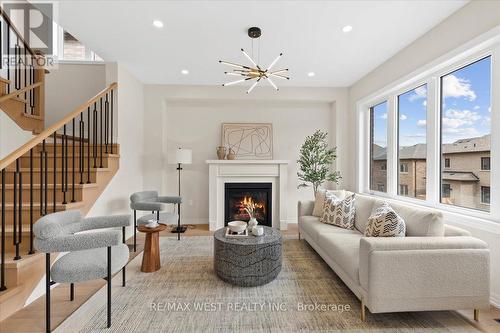 23 Ed Ewert Avenue, Clarington, ON - Indoor Photo Showing Living Room With Fireplace