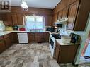 Holinaty Acreage, Porcupine Rm No. 395, SK  - Indoor Photo Showing Kitchen With Double Sink 