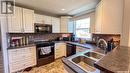 2151 95Th Street, North Battleford, SK  - Indoor Photo Showing Kitchen With Double Sink 