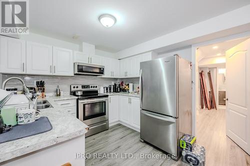 13 Legend Lane, Brampton (Fletcher'S Creek Village), ON - Indoor Photo Showing Kitchen With Double Sink