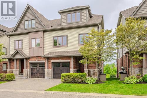 22B - 146 Downey Road, Guelph (Kortright Hills), ON - Outdoor With Facade