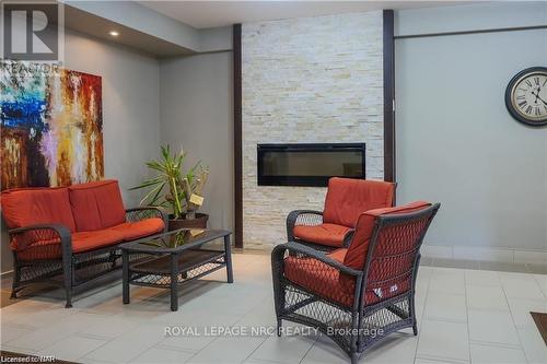 106 - 6400 Huggins Street, Niagara Falls, ON - Indoor With Fireplace