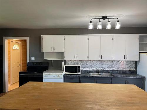 59 Second Avenue, Swan River, MB - Indoor Photo Showing Kitchen