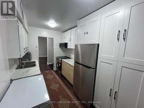 716 - 370 Dixon Road, Toronto (Kingsview Village-The Westway), ON - Indoor Photo Showing Kitchen With Double Sink