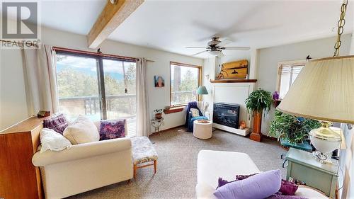 1721 13Th  Avenue, Invermere, BC - Indoor Photo Showing Living Room With Fireplace