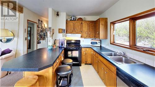 1721 13Th  Avenue, Invermere, BC - Indoor Photo Showing Kitchen With Double Sink