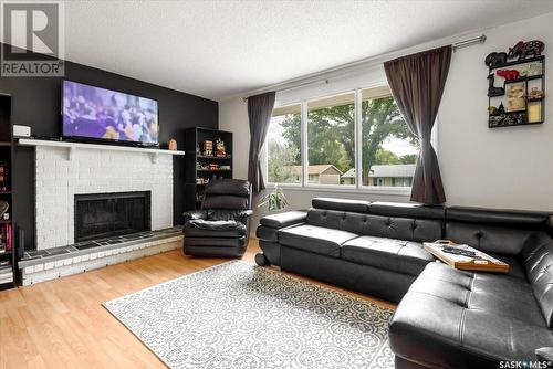 419 Palliser Street, Regina, SK - Indoor Photo Showing Living Room With Fireplace